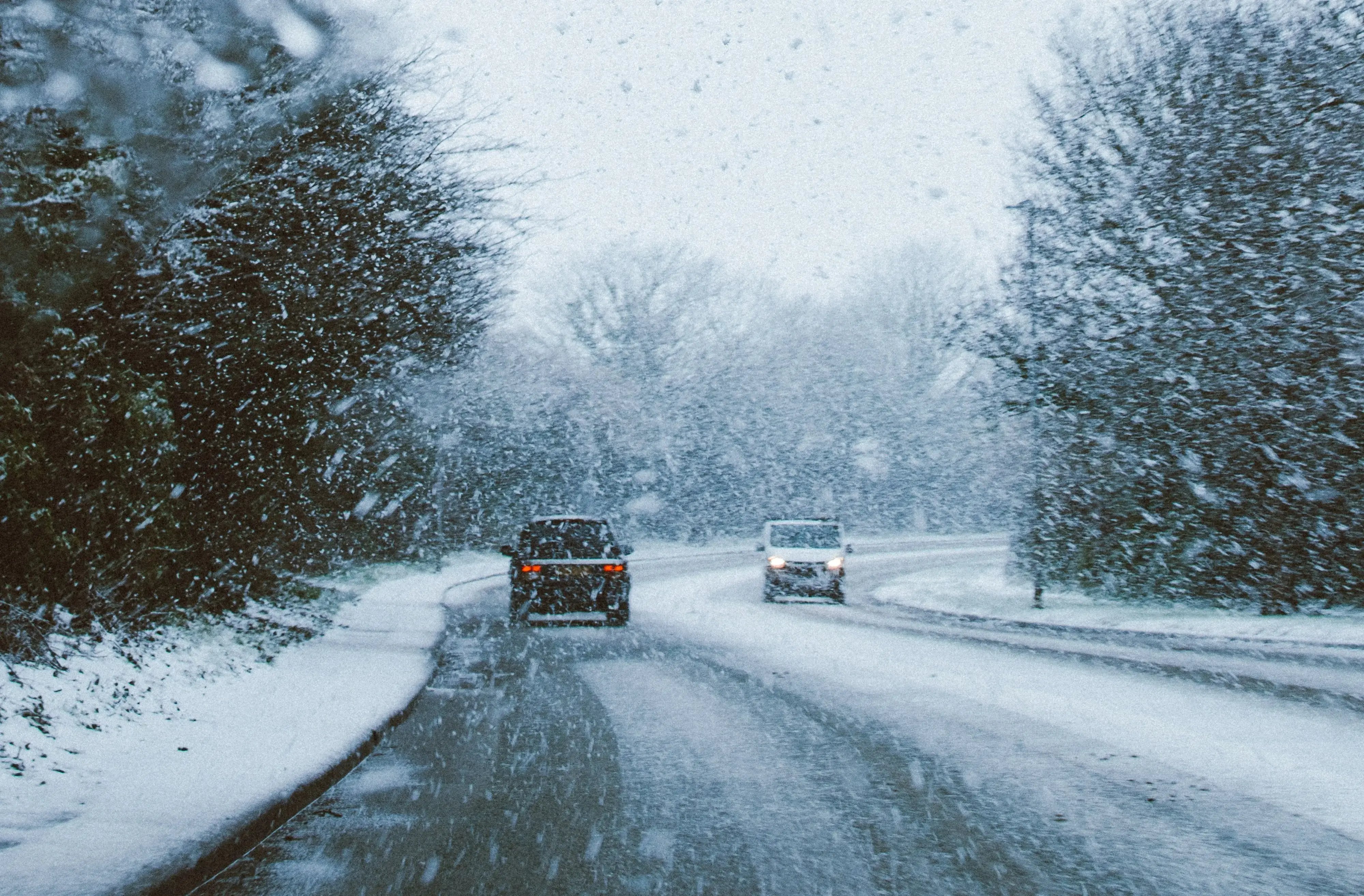 cars-snowy-roads-wide-shot