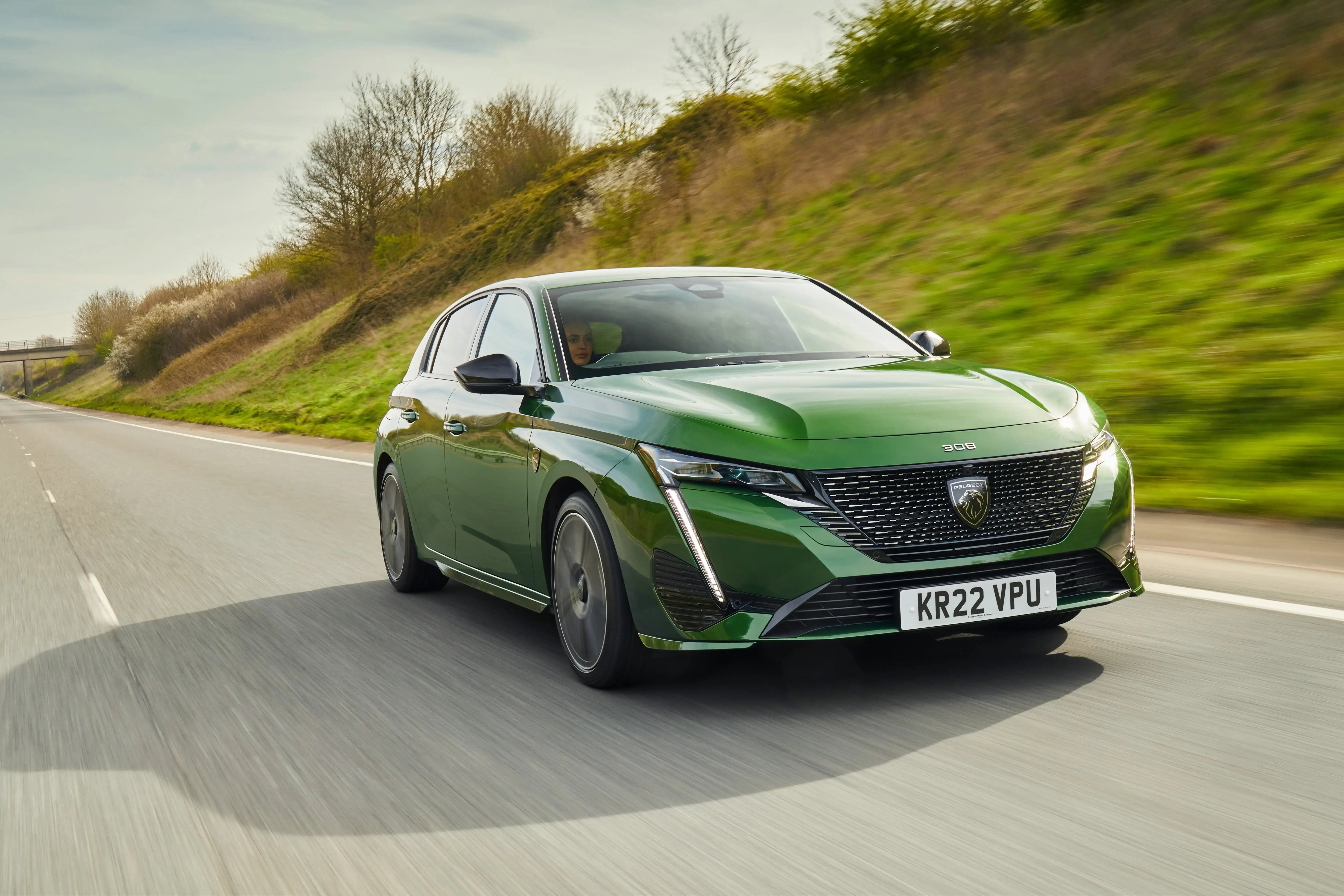 green-Peugeot-308-road-front