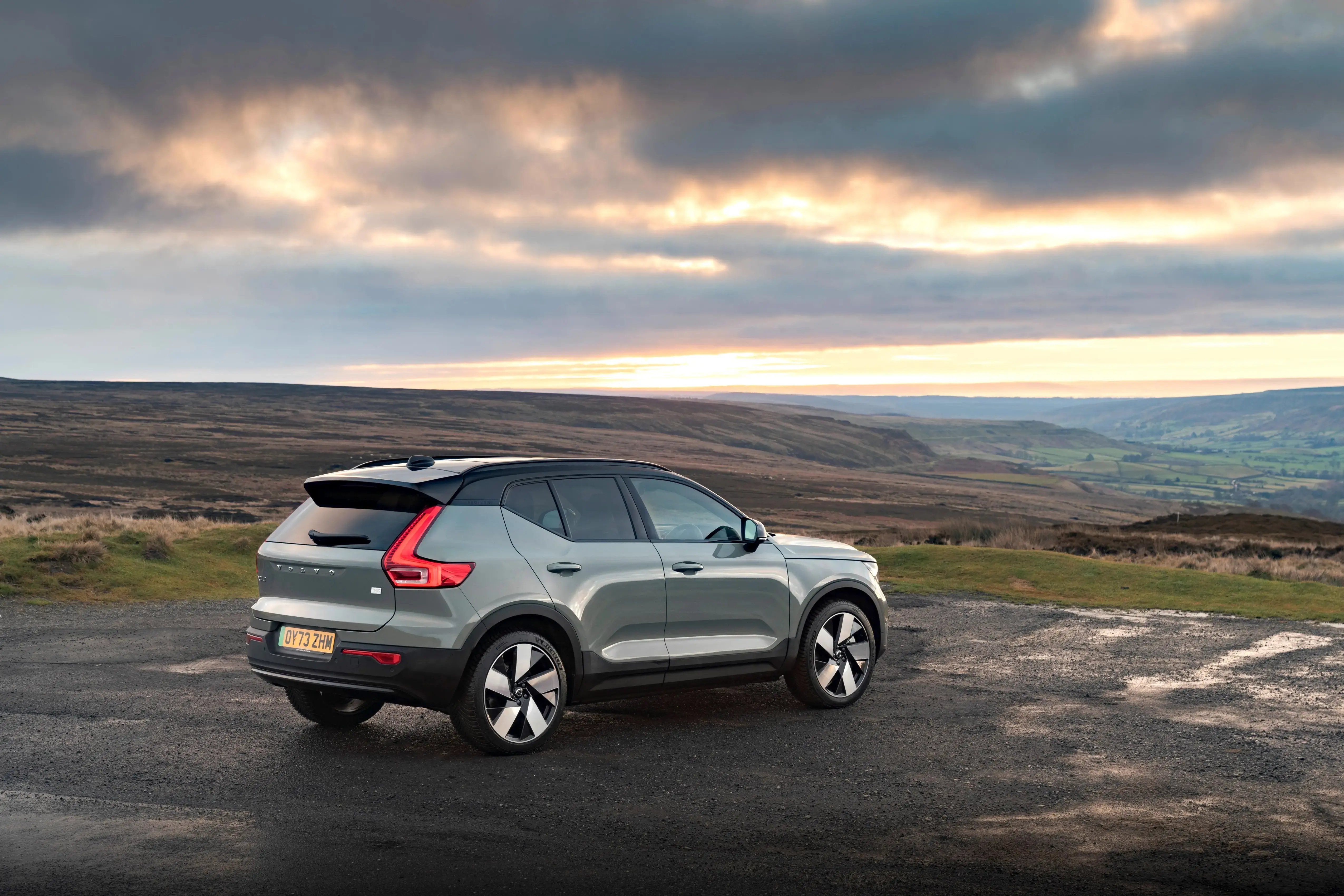 olive-green-Volvo-XC40-back-parked