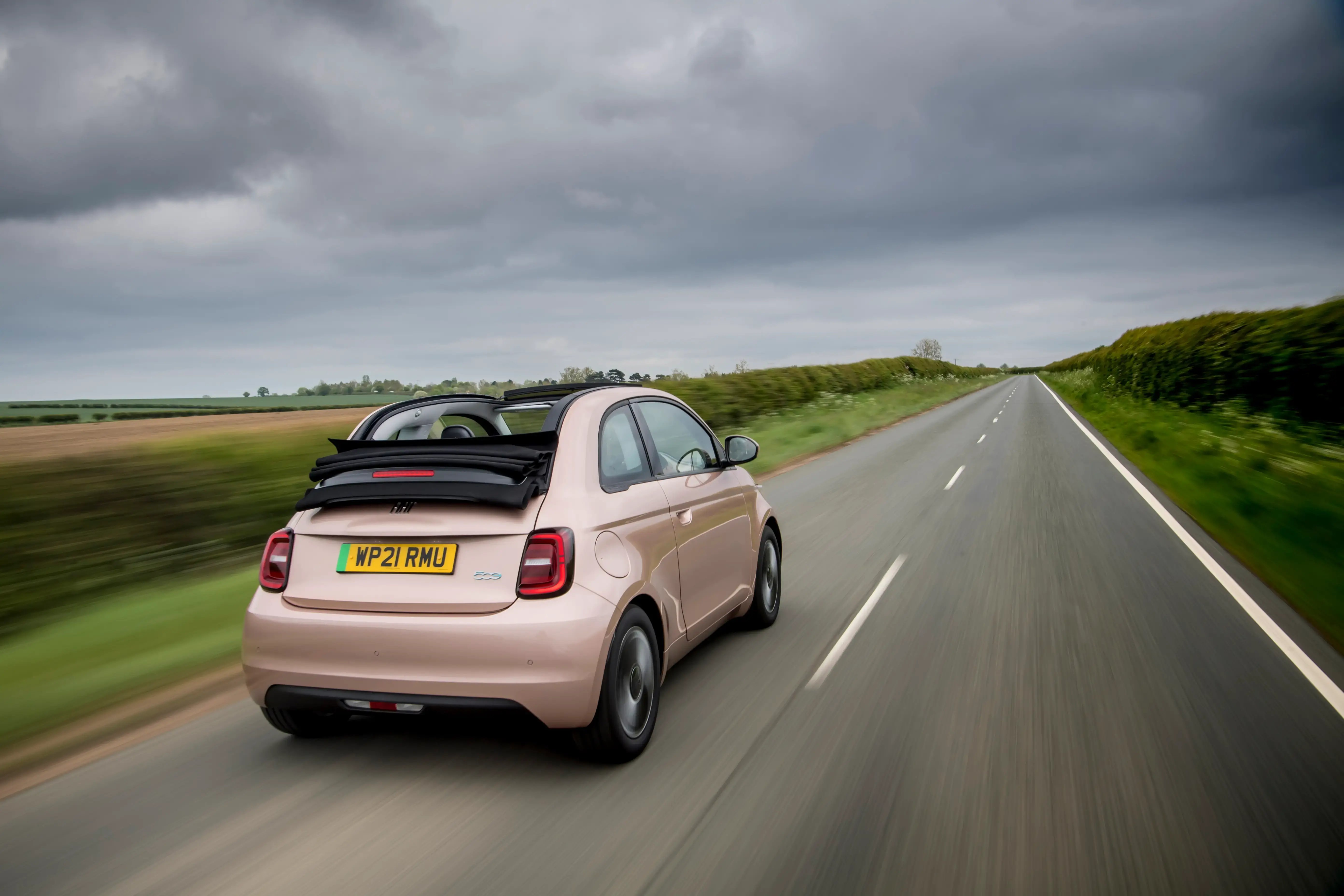 salmon-pink-fiat-500E-convertible-back